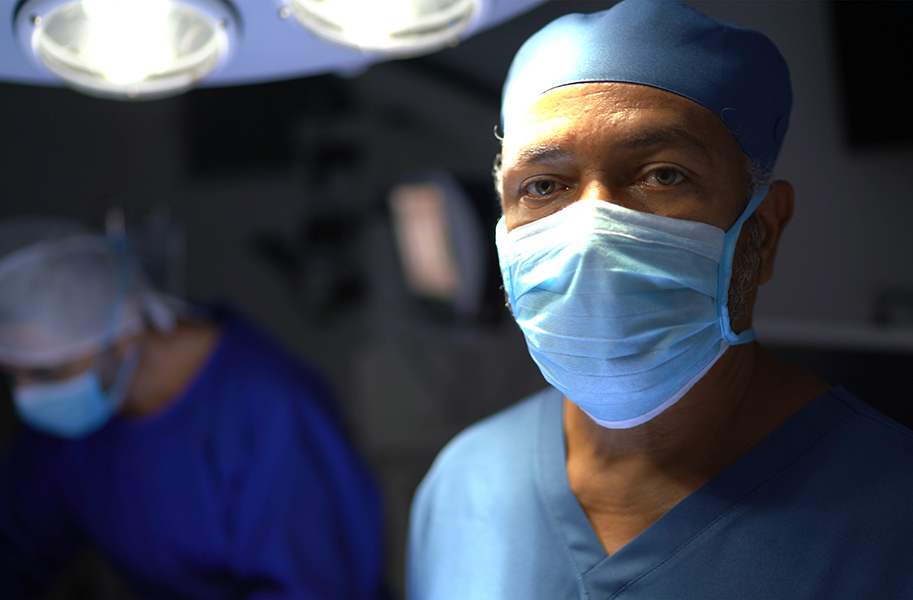 Portrait of a male healthcare worker at operating room in hospital